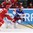 OSTRAVA, CZECH REPUBLIC - MAY 9: Russia's Yevgeni Dadonov #63 stickhandles the puck away from Belarus' Oleg Yevenko #25 during preliminary round action at the 2015 IIHF Ice Hockey World Championship. (Photo by Richard Wolowicz/HHOF-IIHF Images)

